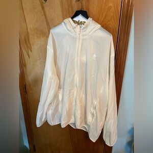 2X cream colored Adidas windbreaker